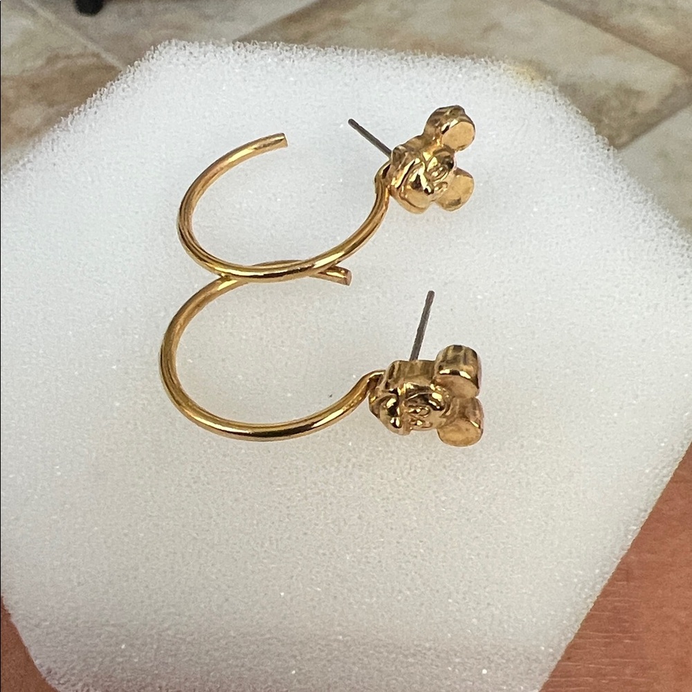 Vintage Micky Mouse Gold tone hoop earrings. Missing backs.